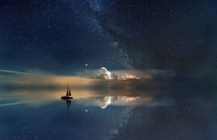 a sailboat at night.