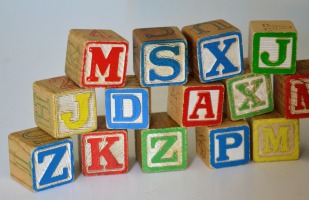 Alphabet blocks stacked on top of each other